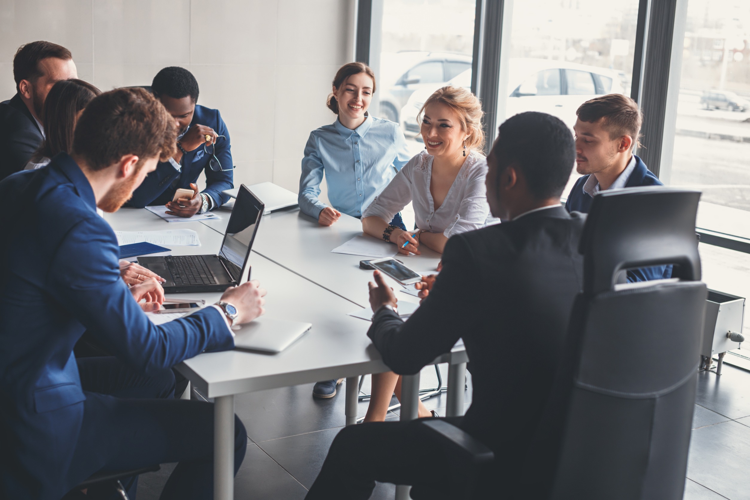 HR Professionals Gather In A Bright Office Environment For A Productive Meeting On Company Culture Types